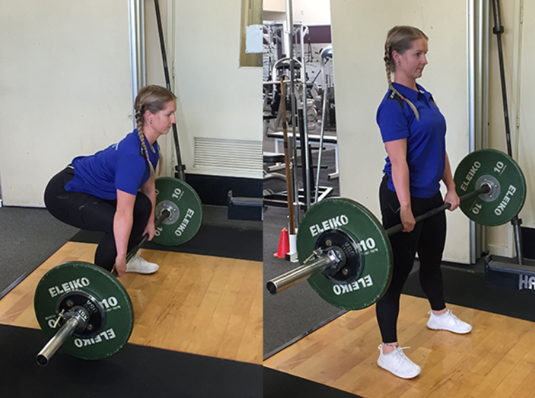 Mec Athlétique Faisant Deadlift Avec Barre De Piège